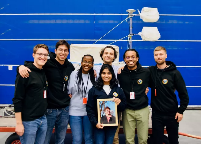 The team members (from left to right): Jonathan Holtkamp, Paul Figueroa Cotorogea, Elsie Watare Kiema, Teodor Salomea, Arunima Das, Ian Mambea Solomon, Ivan Rodionov. Arunima holds a photo of the late team leader Matthias Graf, who initiated the project, in her hands.