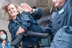 Aerospace student experiences weightlessness during parabolic flight