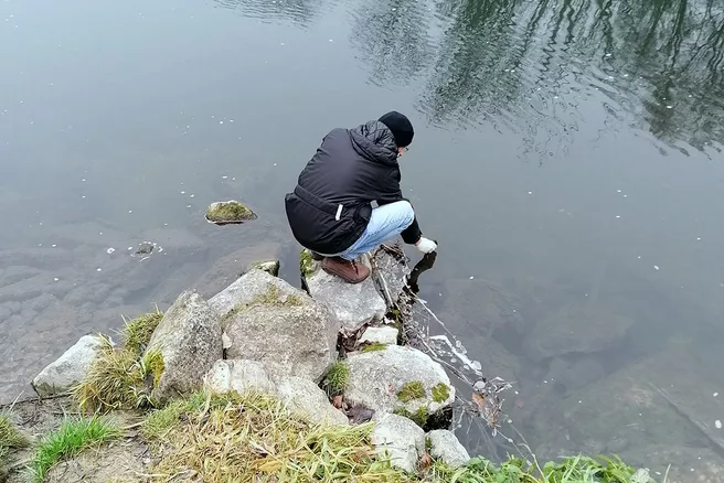 Man taking a water sample